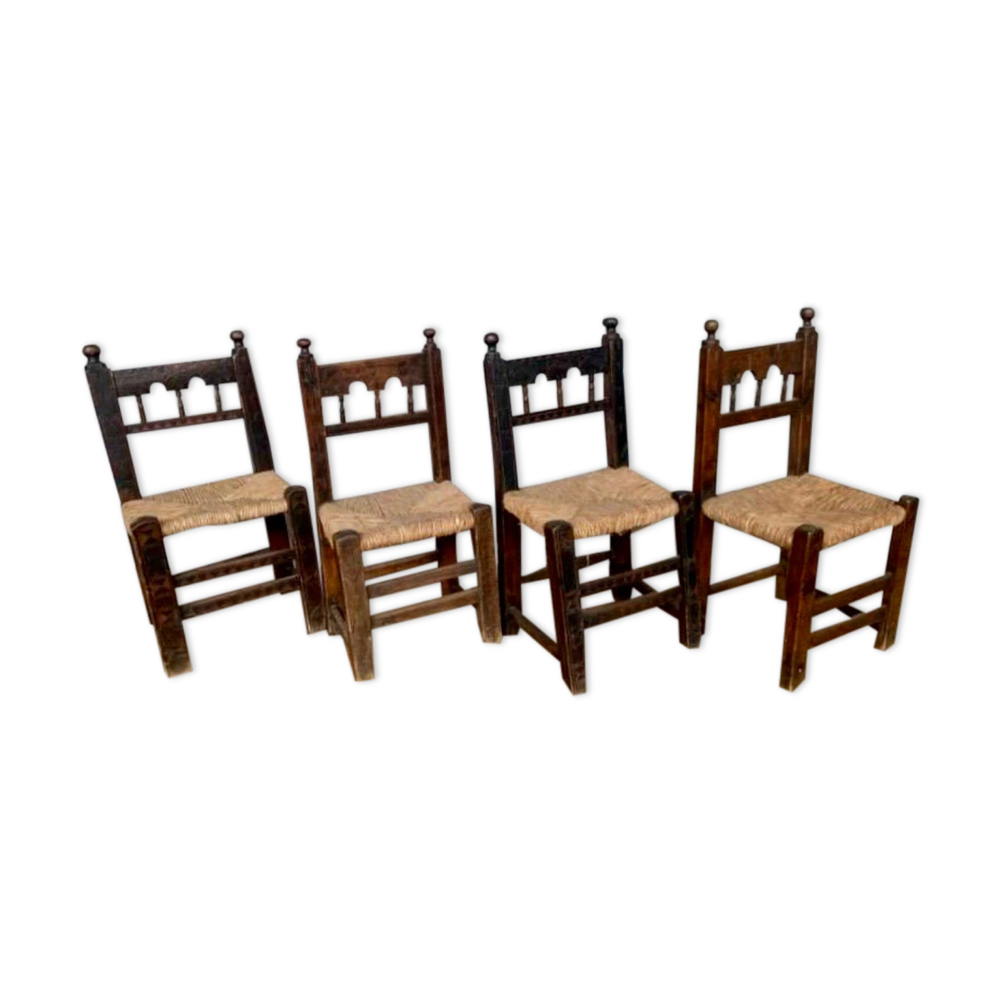 Series of 4 brutalist rustic chairs in carved wood straw seat