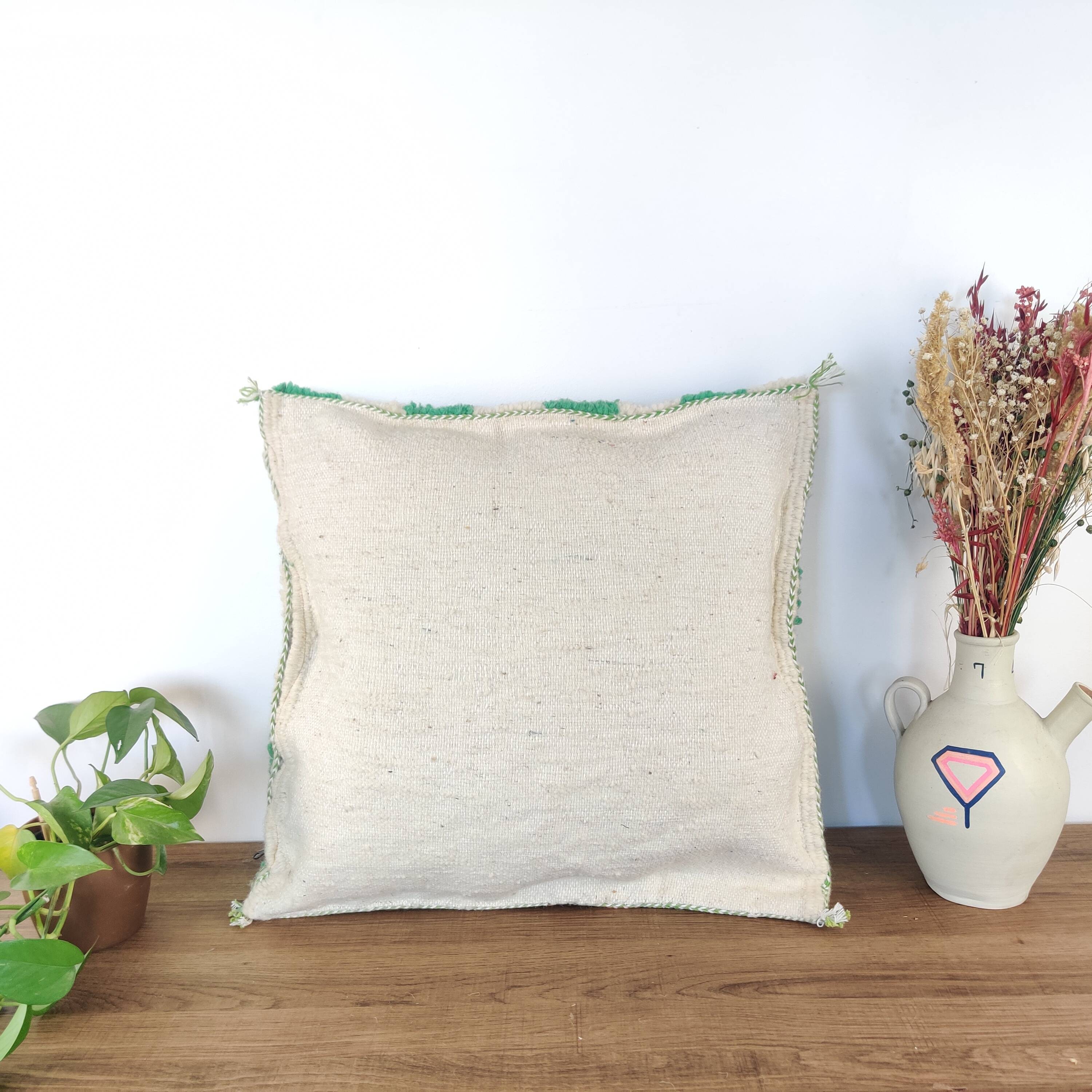 Berber green checkerboard cushion