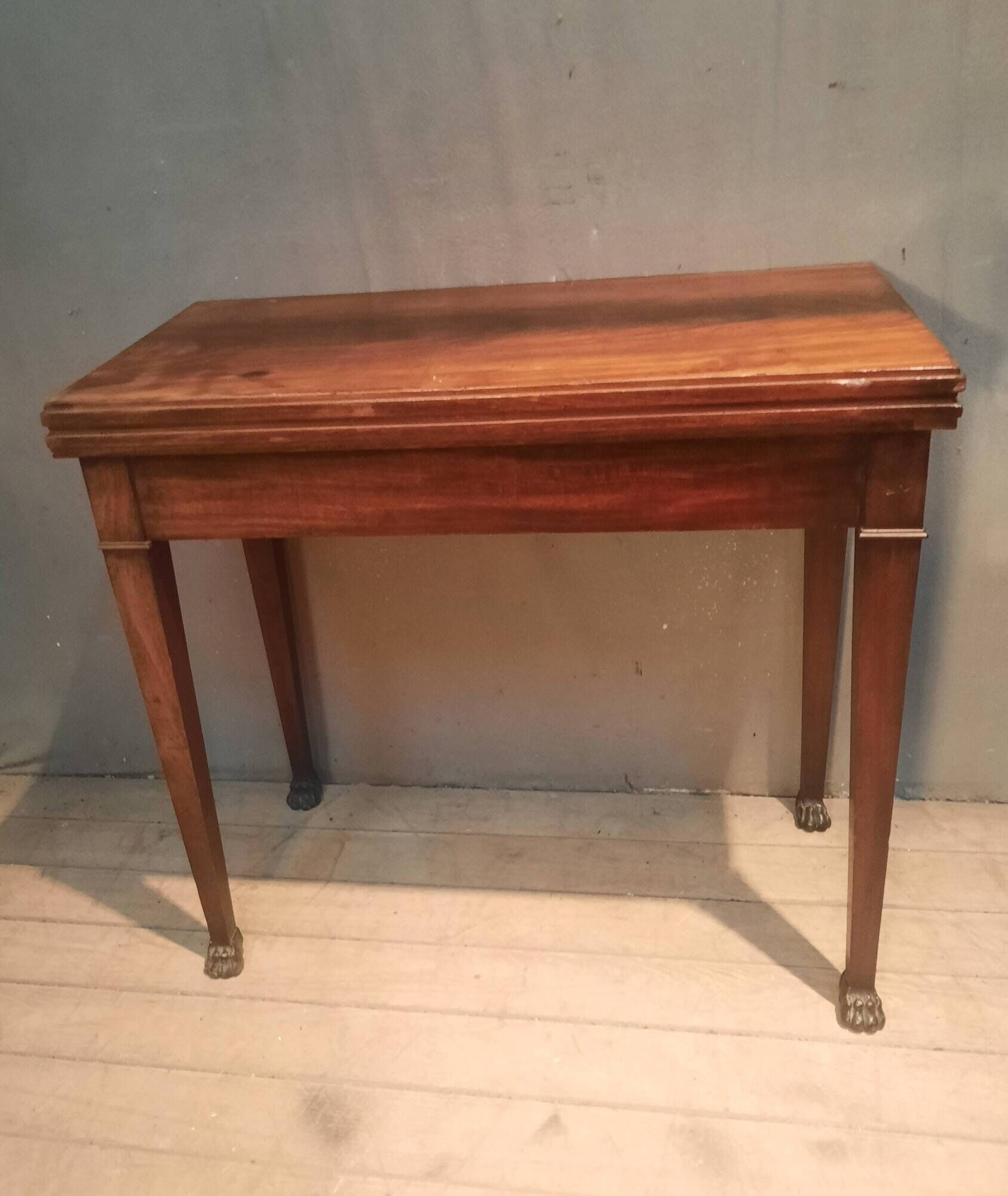 Rectangular console that transforms into a game table.