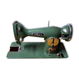 Machine à coudre intégrée meuble