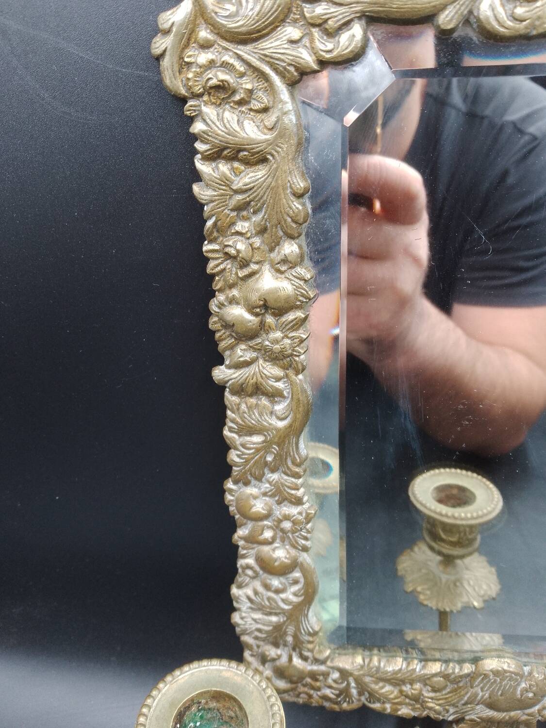 Repousse brass wall mirror with three candles, beveled glass, end of 19th century, double eagles