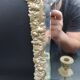 Repousse brass wall mirror with three candles, beveled glass, end of 19th century, double eagles