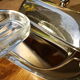 Butter maker in metal and glass