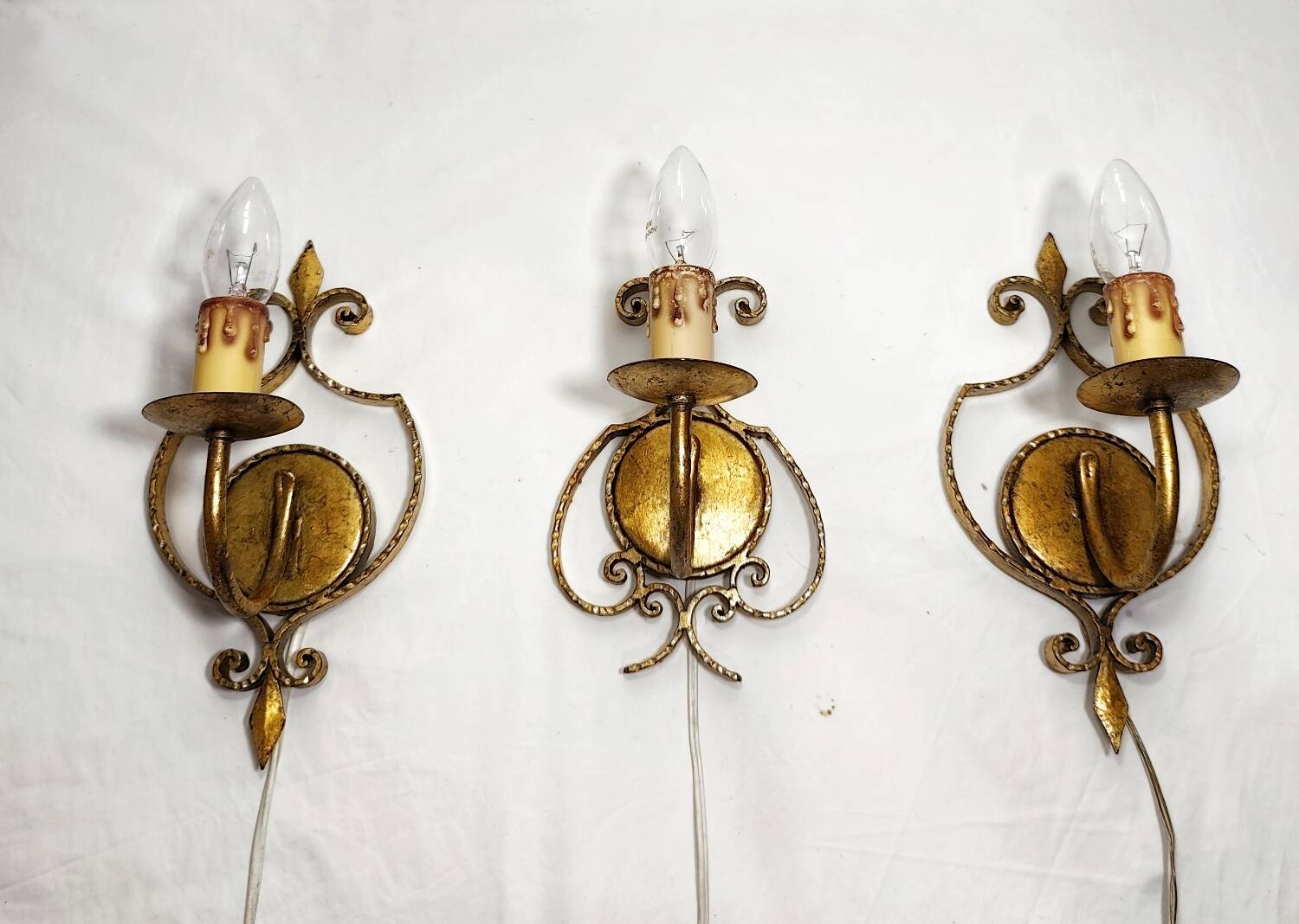 Apliques de hierro forjado y pan de oro. España, 1960s.