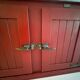 Low red "Guérande" buffet, zinc top, butcher's fridge-style doors