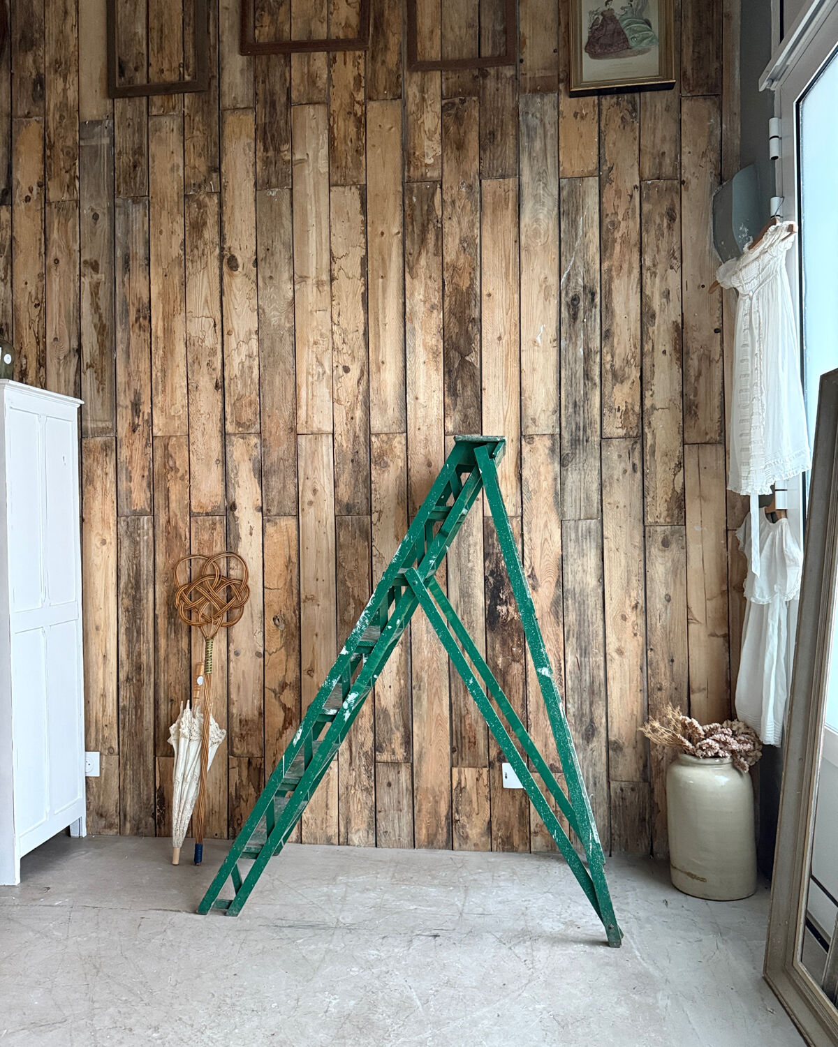Vintage stepladder with green patina