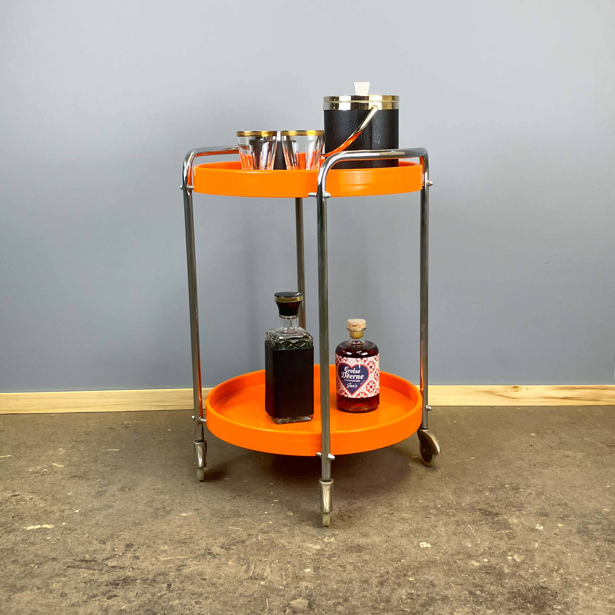 Space Age serving trolley, chrome and orange plastic trays, 1970s