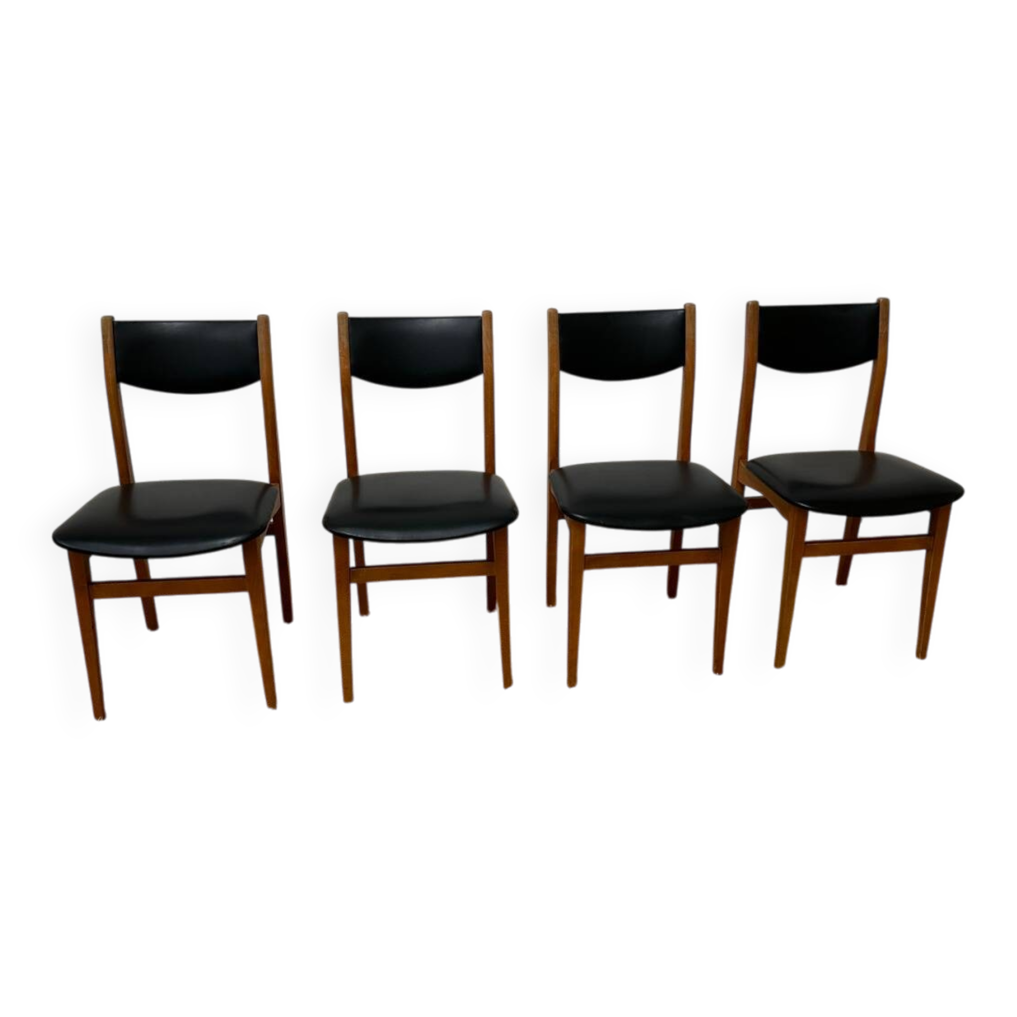 4 Scandinavian chairs in teak and black faux leather.