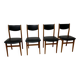 4 Scandinavian chairs in teak and black faux leather.