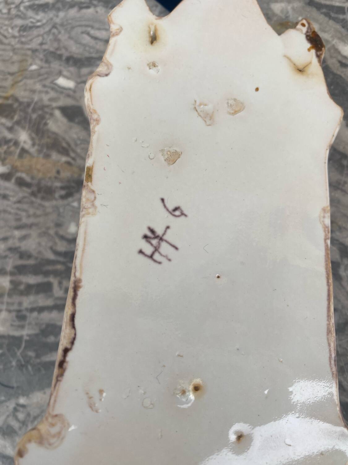 Antique holy water font in polychrome enamelled earthenware signed