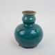 Small old blue ceramic vase