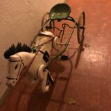 Old pedal horse with sulky