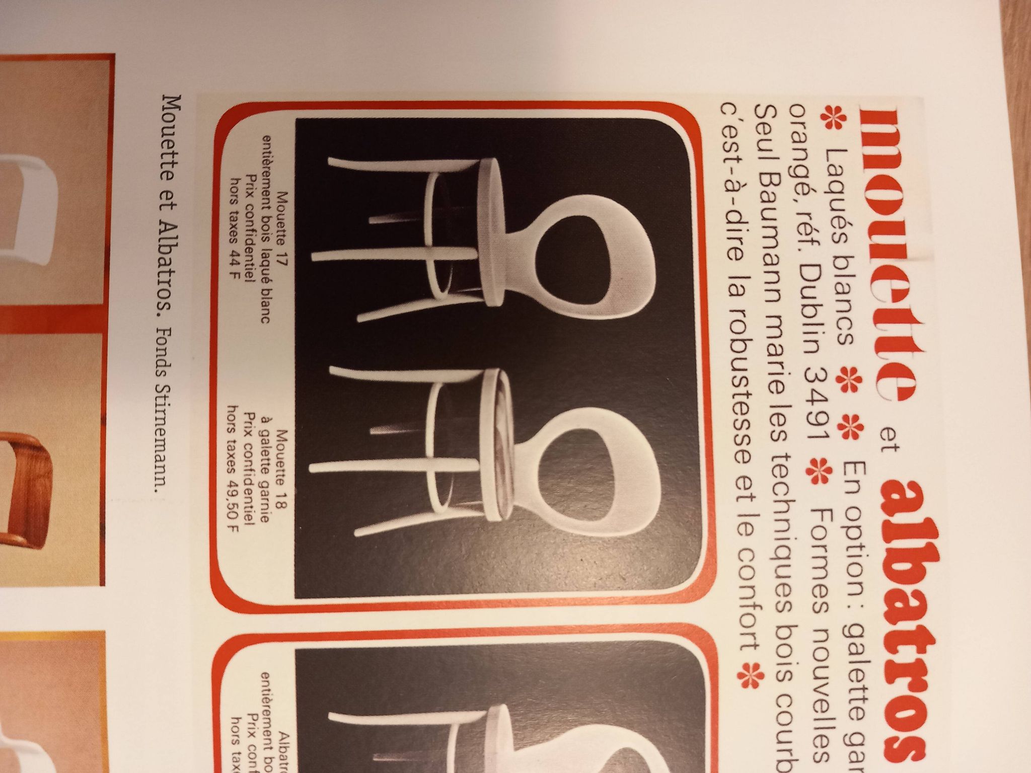 Set of 4 vintage Mouette chairs by Baumann in black wood from the 1960s.