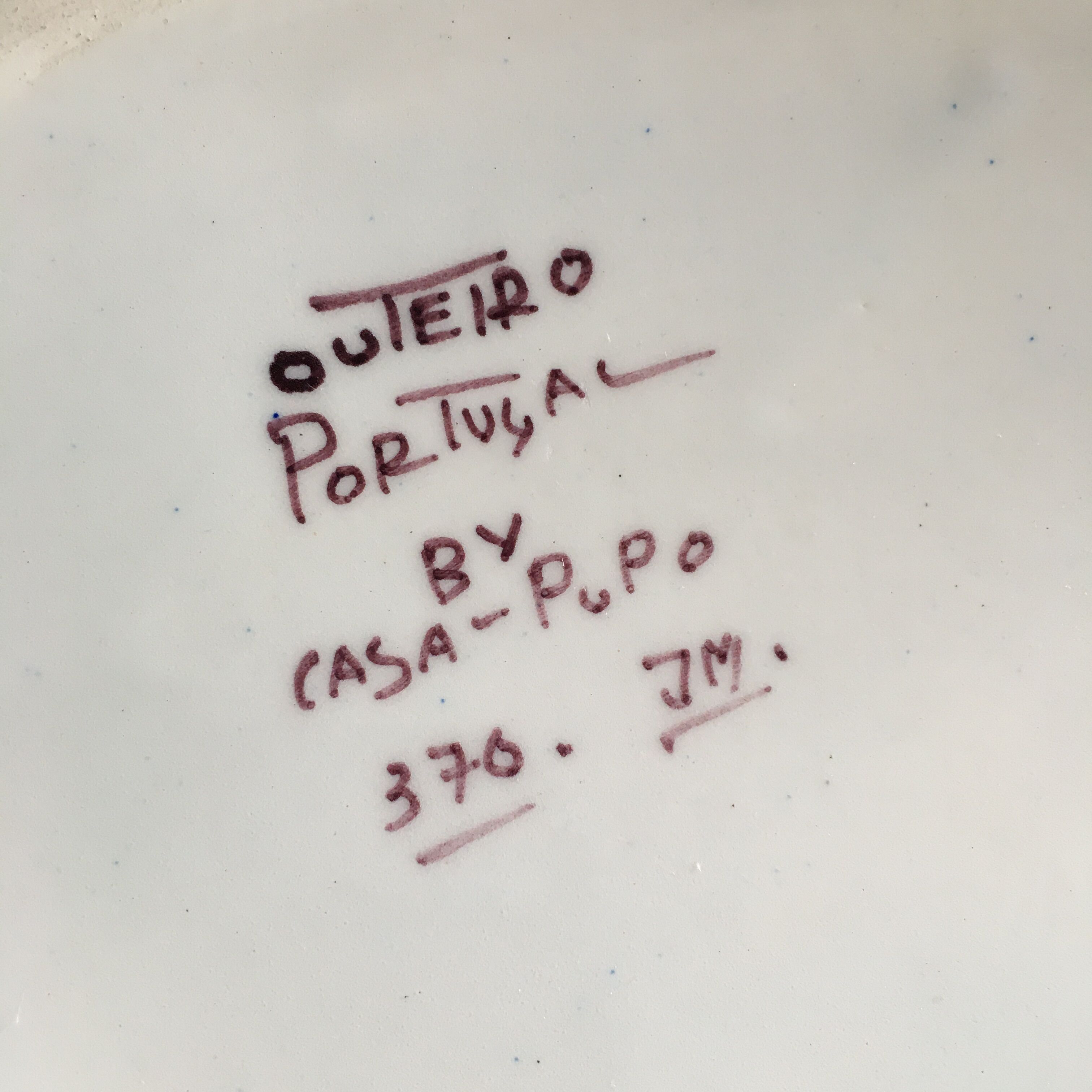 Empty openwork pocket signed