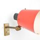 Old and rare Stilnovo wall light, red and black lacquered metal and brass With period label