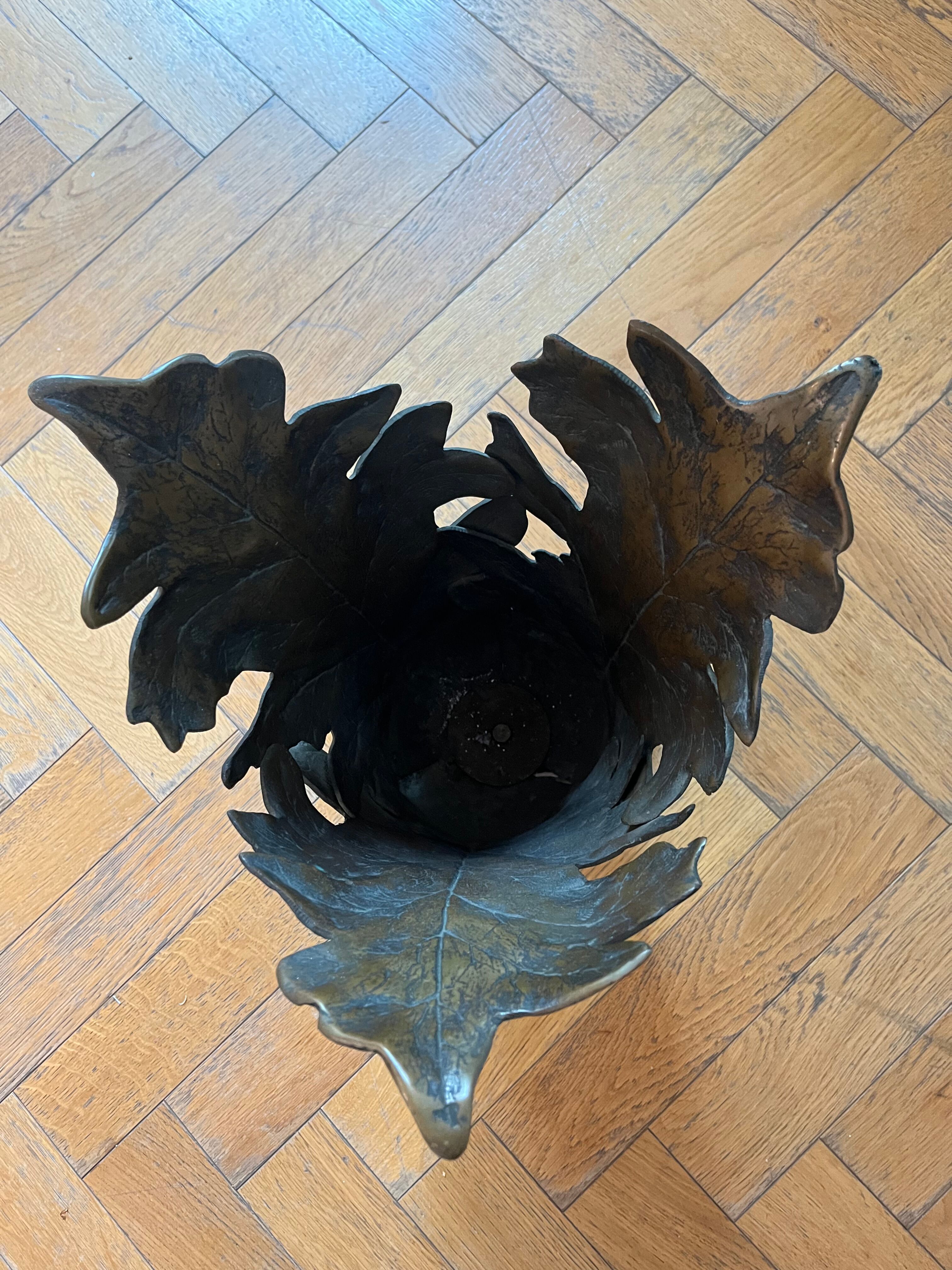 Elegant bronze umbrella door by the famous Italian designer Gabriella Crespi