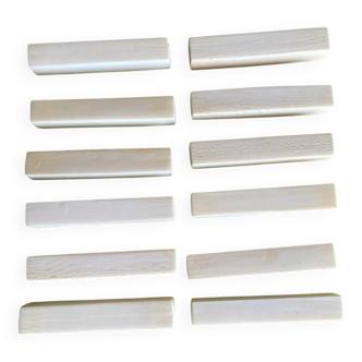 Set of 12 vintage knife rests in polished bone - ivory look, minimal