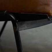 Modernist Dutch lounge chair in enamelled steel and leather from the 1950s.