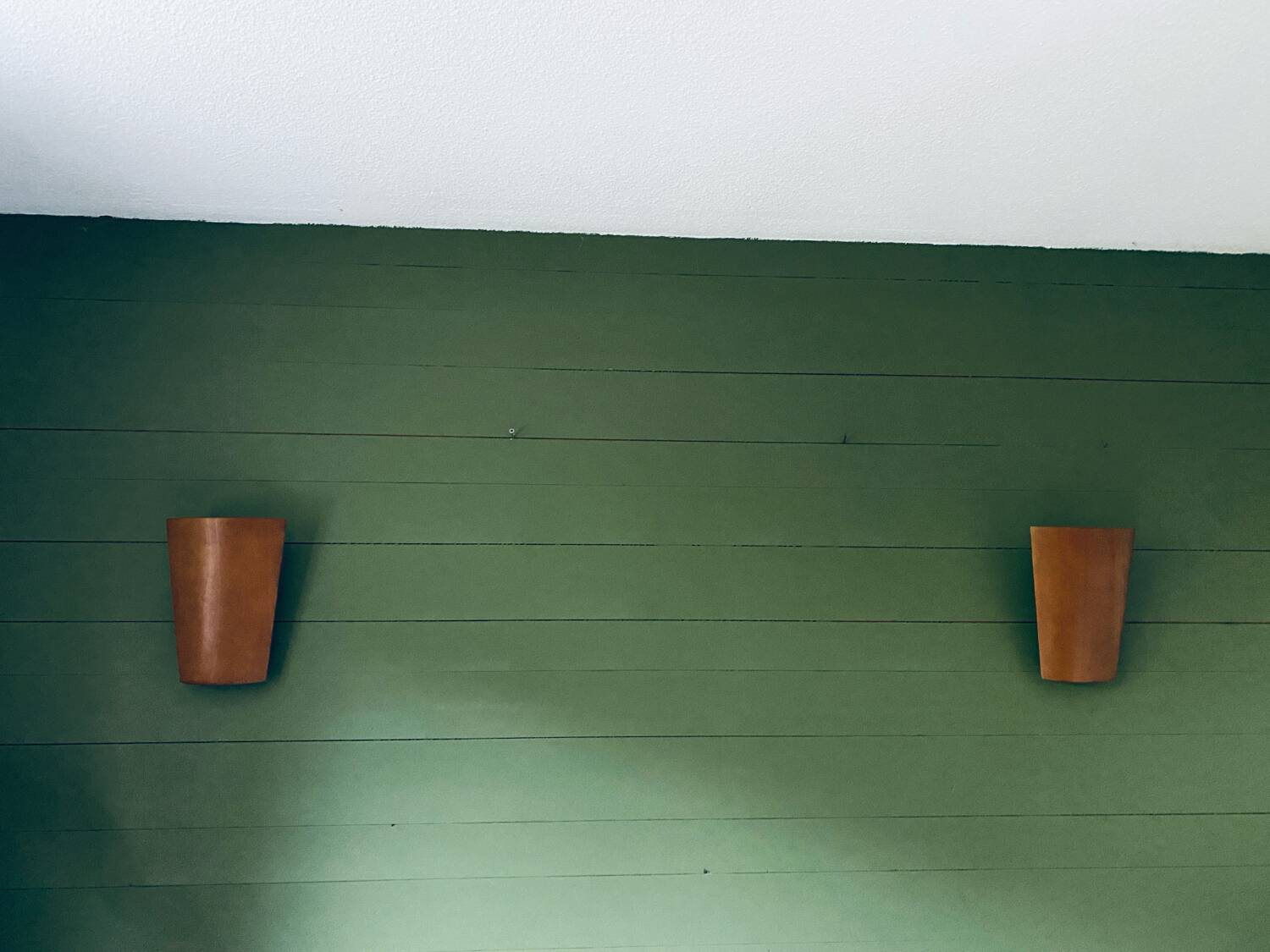 Pair of Lucid designer wall lights