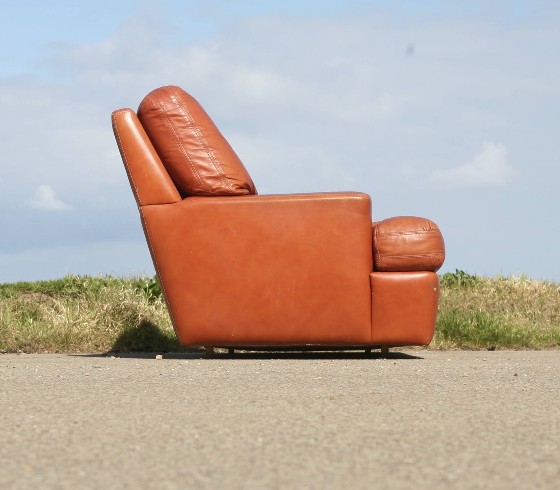 Space age sofa. Tan leather. Circa 1970