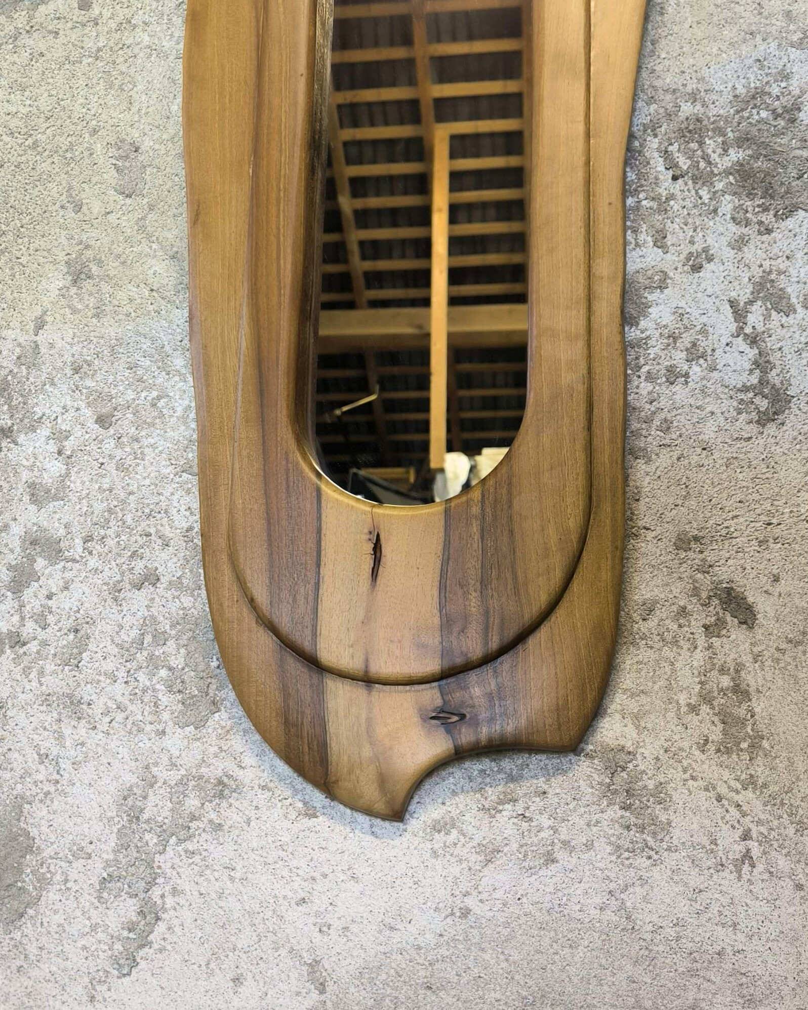Vintage free-form mirror in solid wood.