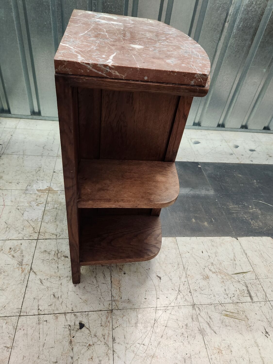 Old bedside table in wood and marble