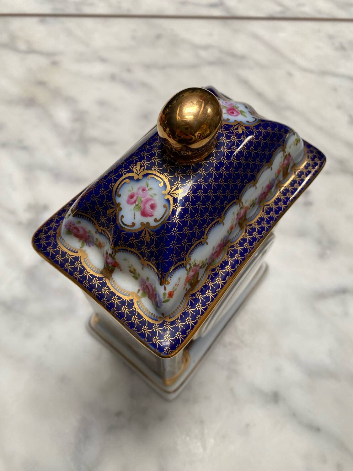English porcelain clock and candle holders