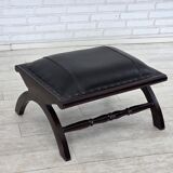 1970s, vintage armchair with footstool, black furniture leather.