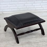 1970s, vintage armchair with footstool, black furniture leather.