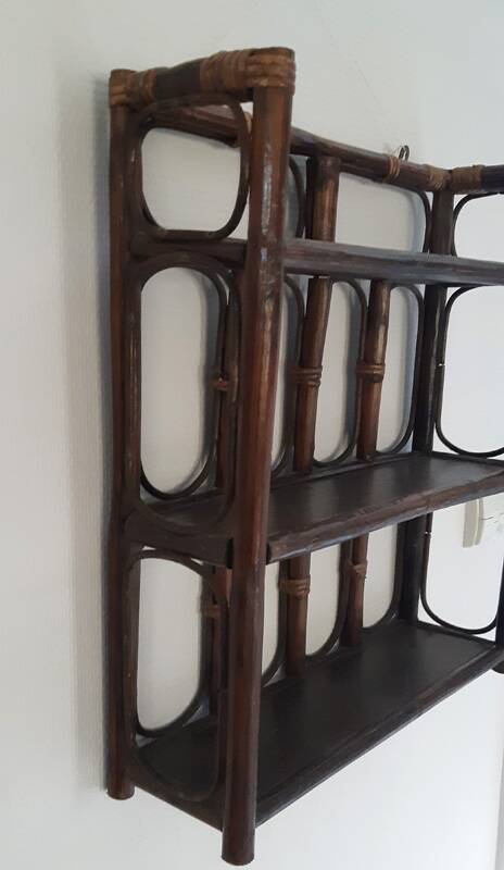 Rattan wall shelf from the 70s.
