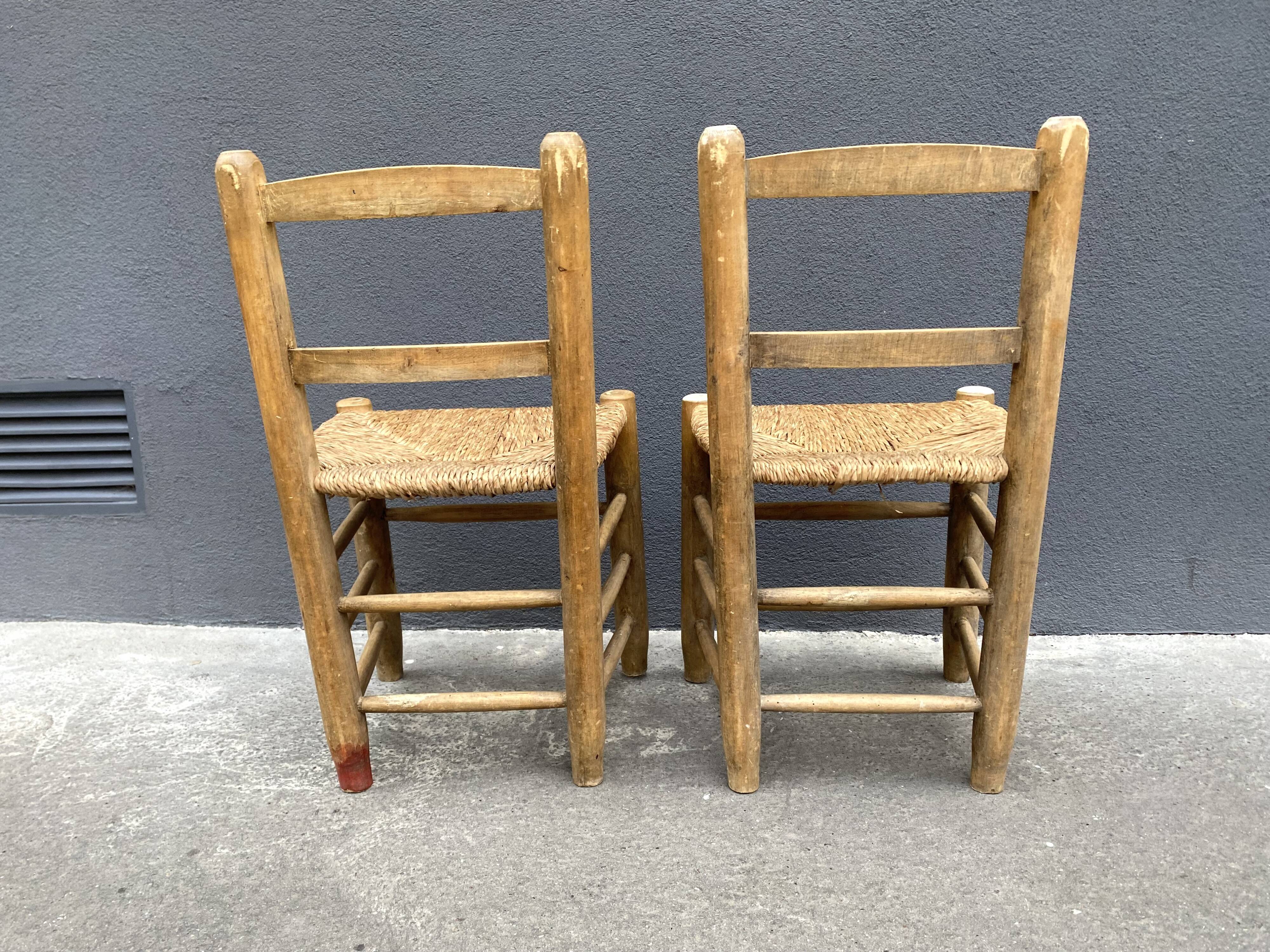 Set of 2 chairs in raw wood and straw from the 50s