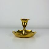 Golden brass candlestick rat of the cellar