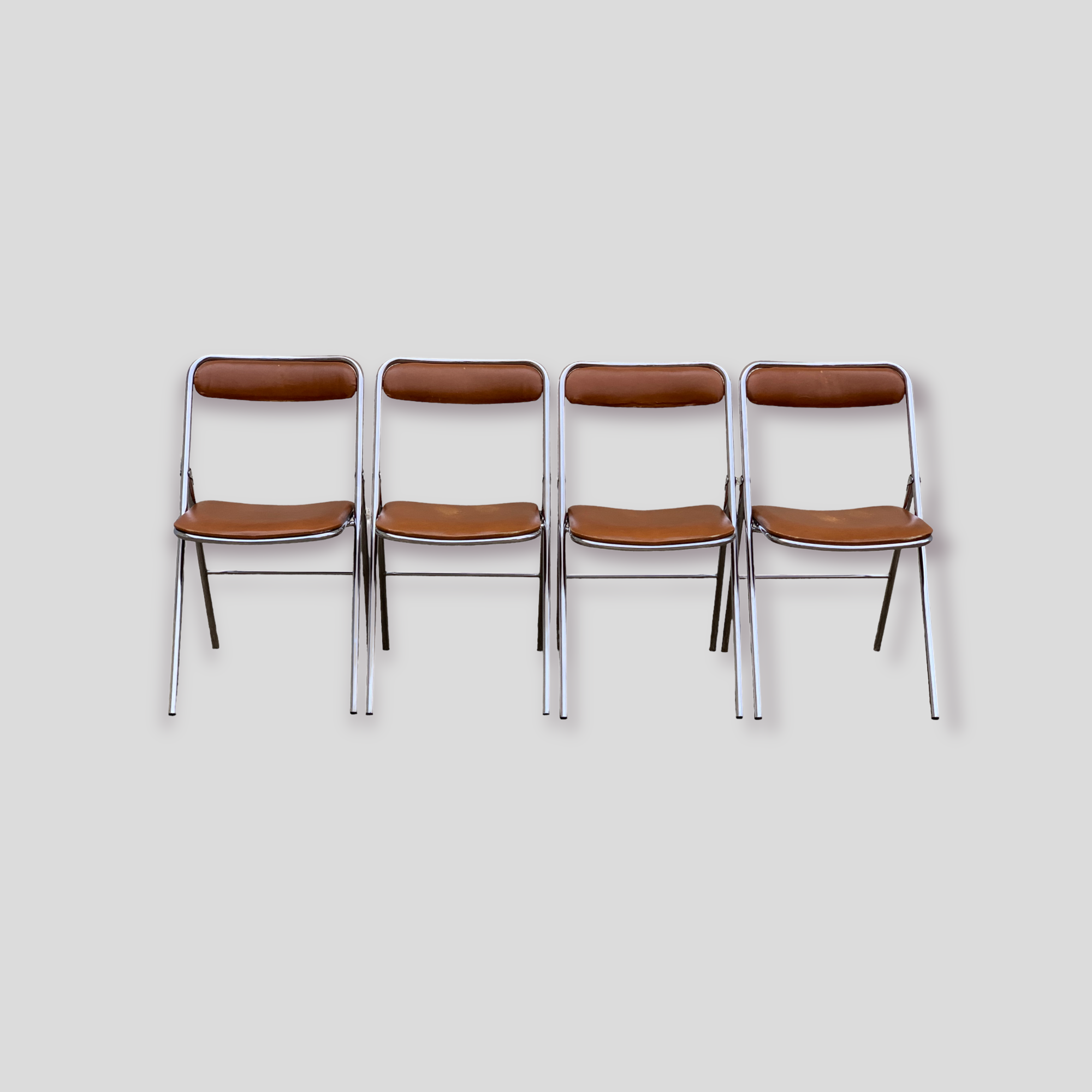 4 folding chairs chromed metal and Skaï fawn 1970