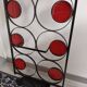 Coat racks, hats and umbrellas wall-mounted in wrought iron.