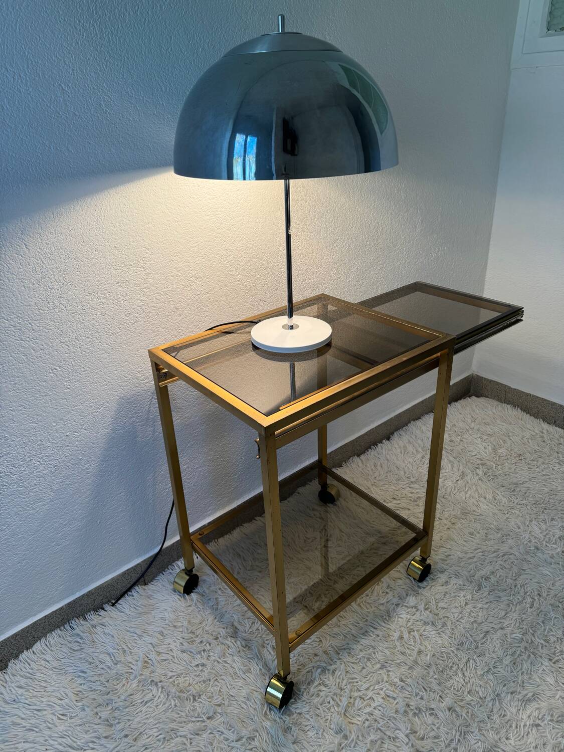 Brass rolling trolley with smoked glass from the 70s