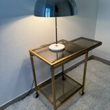 Brass rolling trolley with smoked glass from the 70s