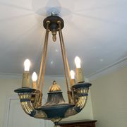 Empire style chandelier with four lights in sheet metal, bronze with patina and gilding