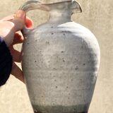 The pitcher / vase in ancient sandstone