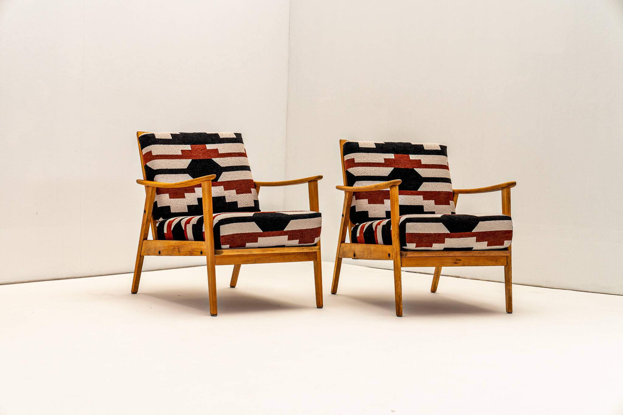Pair of armchairs with bold geometric upholstery