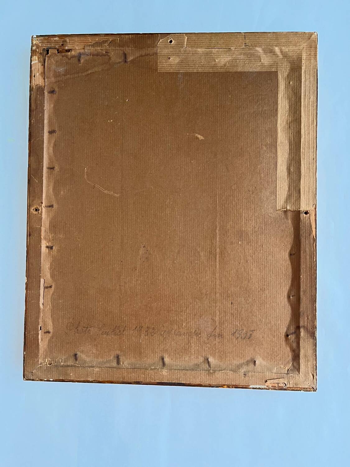 Old photo framed under glass