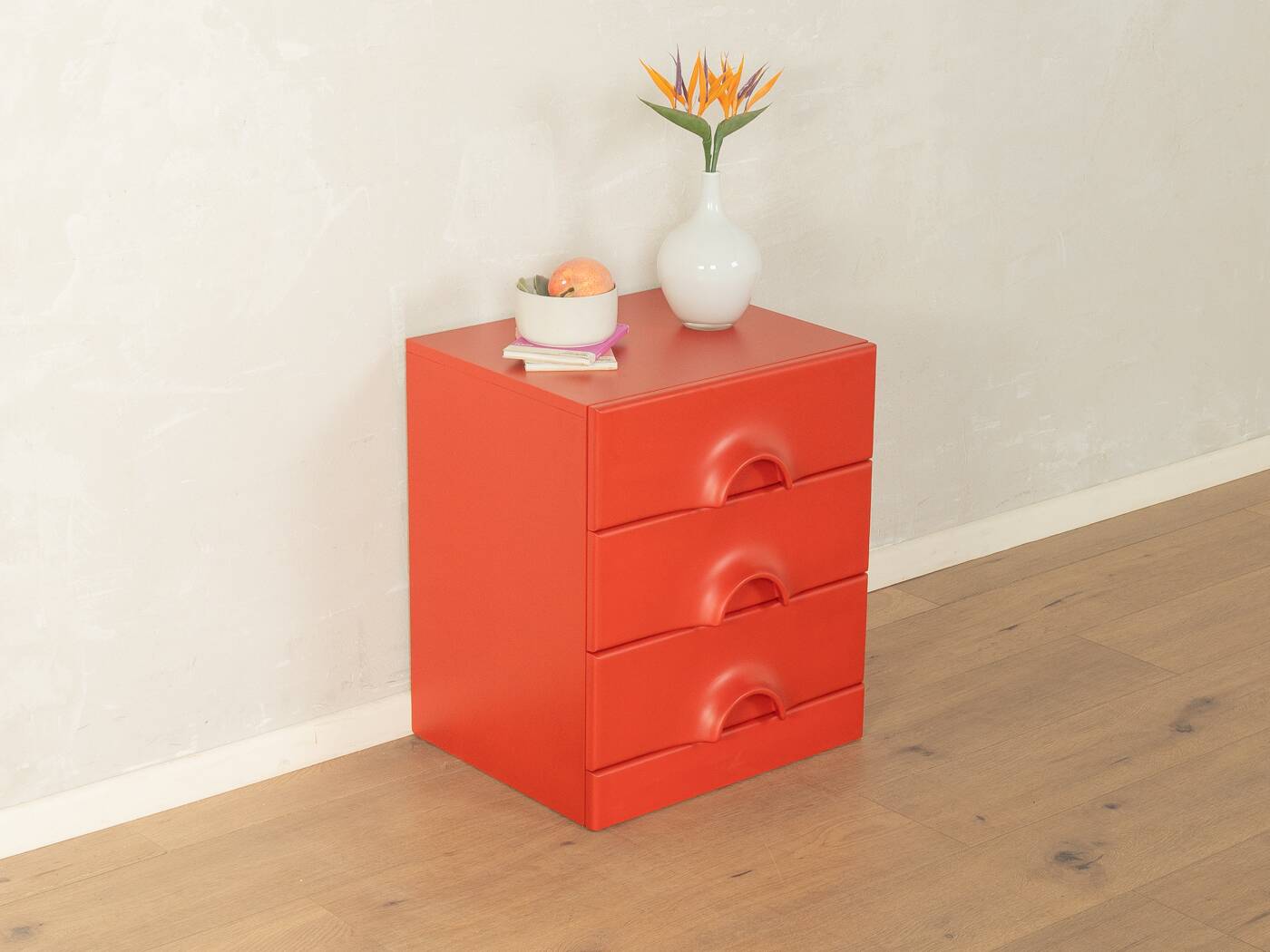 Red chest of drawers by Schönbuch in characteristic Space Age design from the 1970s