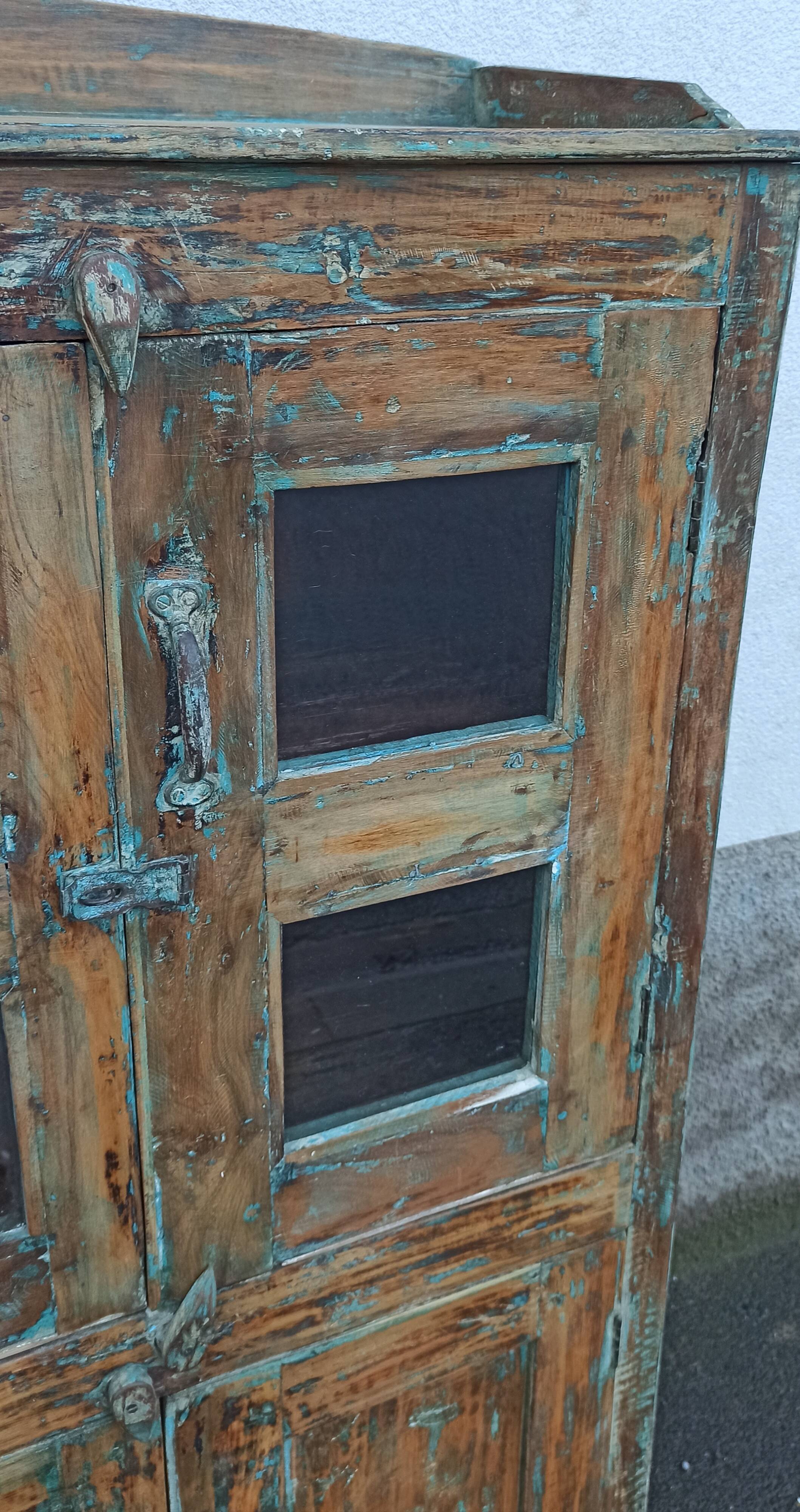 Old wooden cabinet with 4 doors