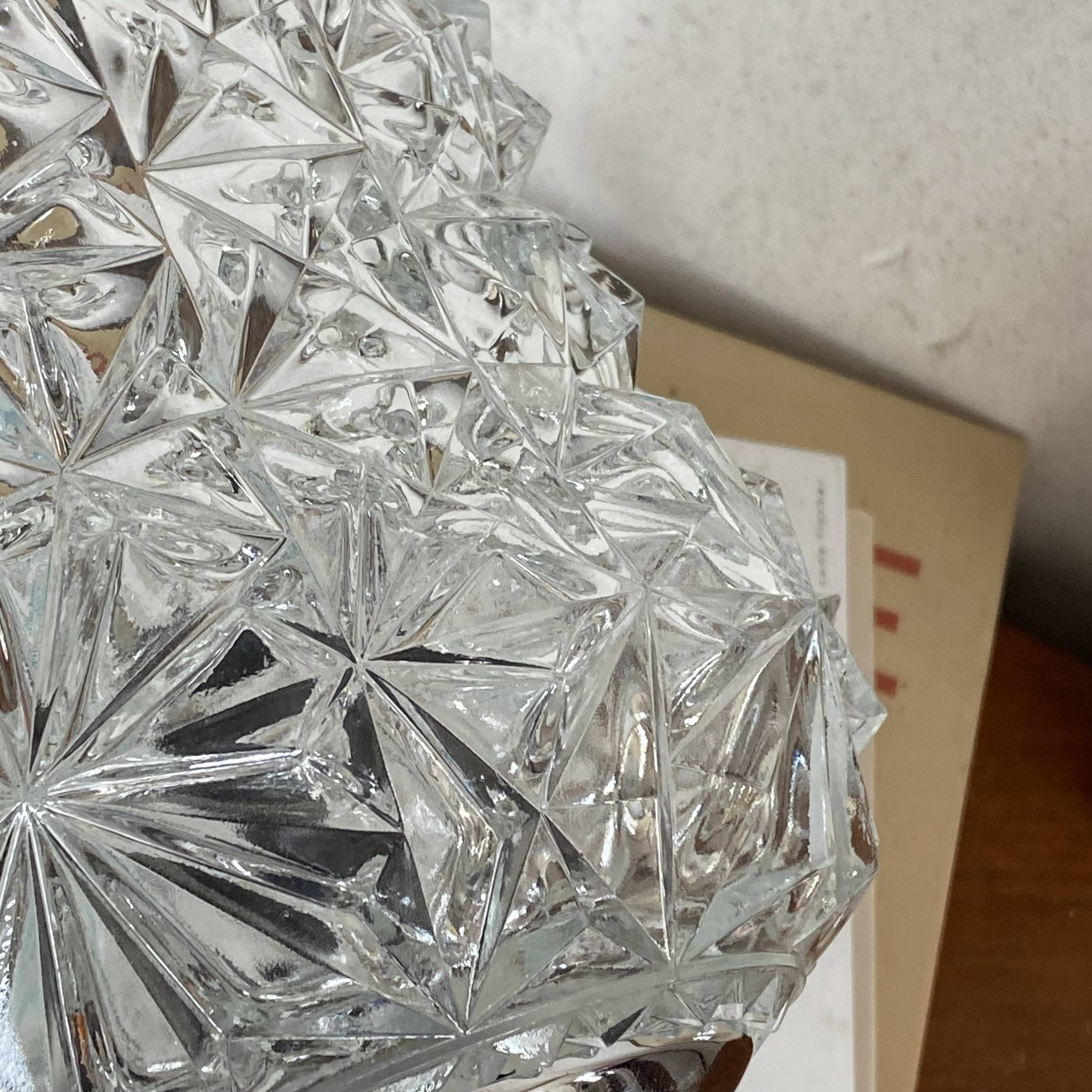 Swan neck wall light in stainless steel, thick glass shade, stainless steel rose.