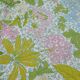 Nappe ronde à décor de fleurs vers 1970