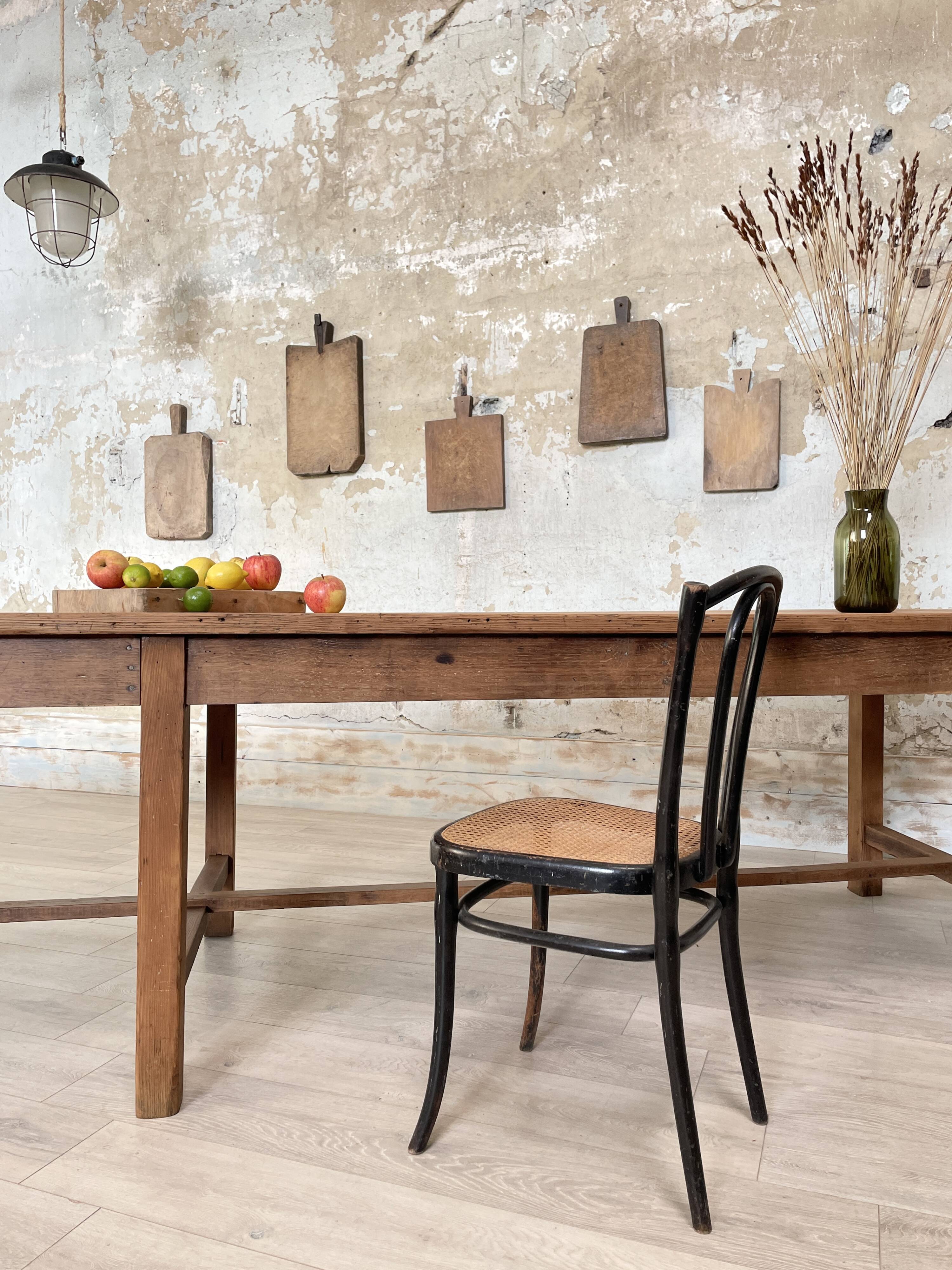 Solid wood workshop table with straight legs.