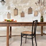 Solid wood workshop table with straight legs.