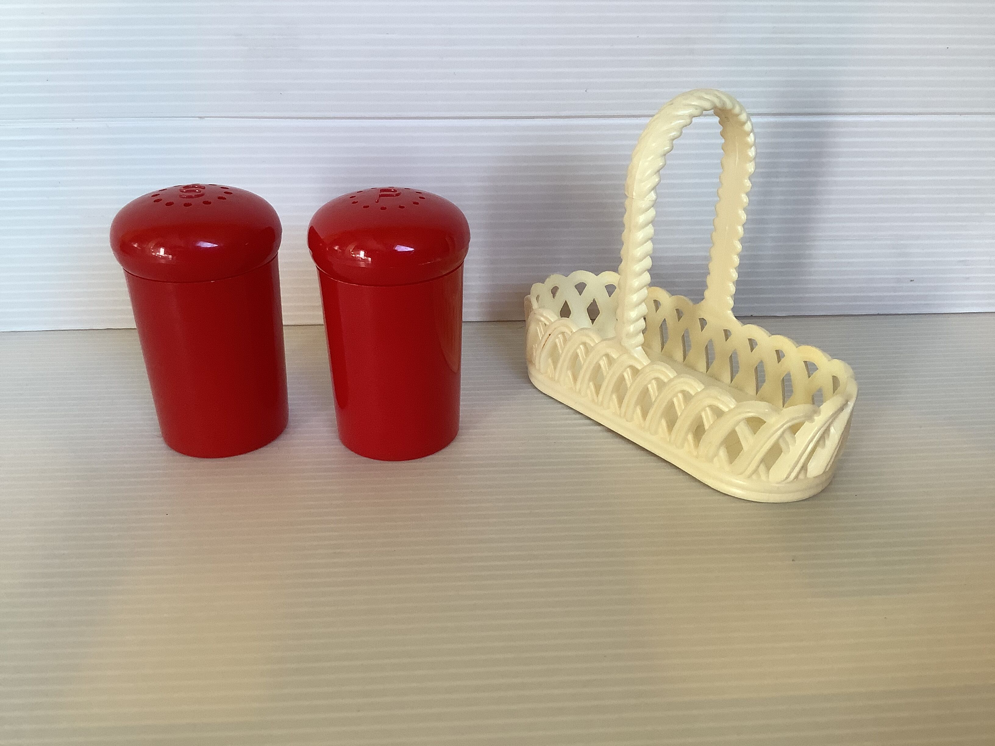 Red and white plastic salt and pepper shakers Emsa.