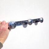 Wall-mounted coat rack circa 1950