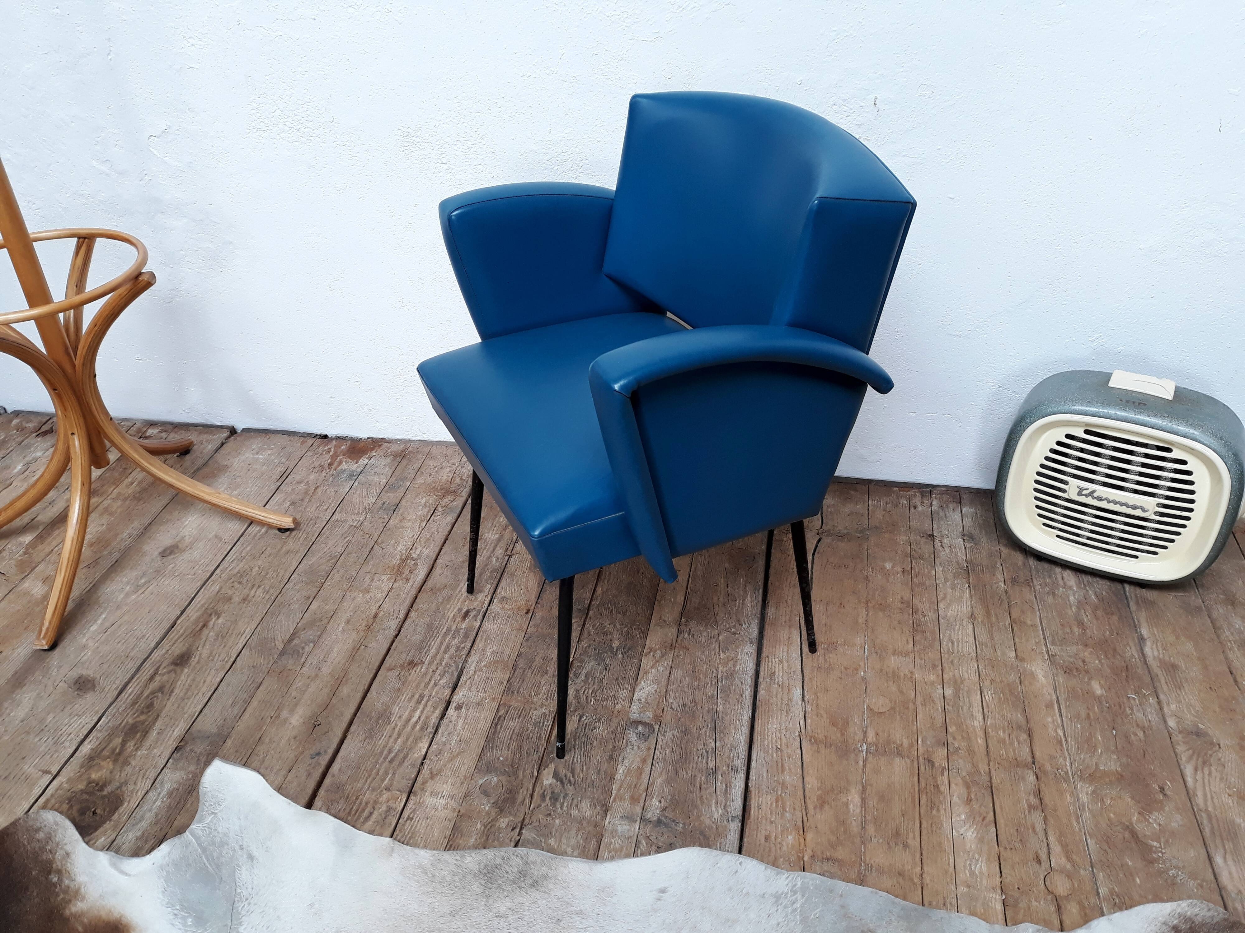 Fauteuil vintage en skaï et pieds métal