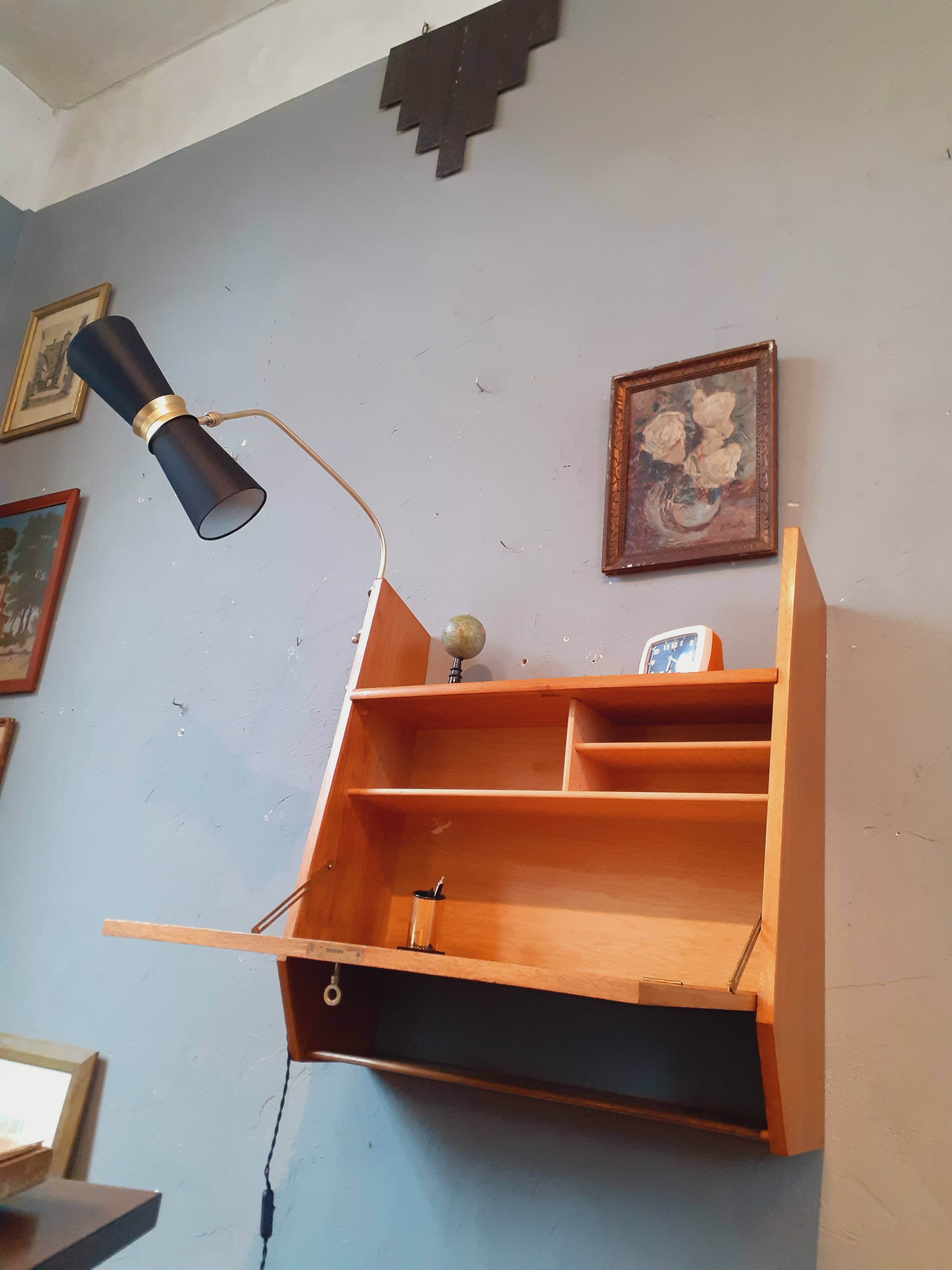 Wall-mounted oak desk from the 1950s.